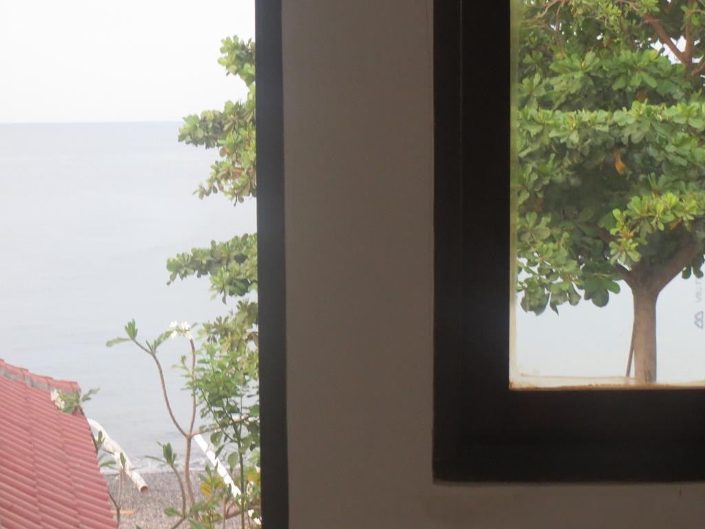 Amed Sari Beach Guesthouse Exterior foto