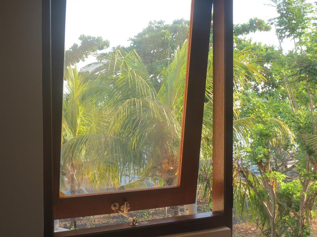 Amed Sari Beach Guesthouse Exterior foto