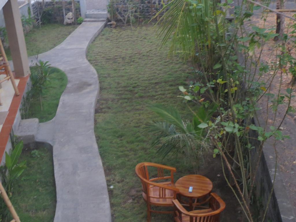 Amed Sari Beach Guesthouse Exterior foto