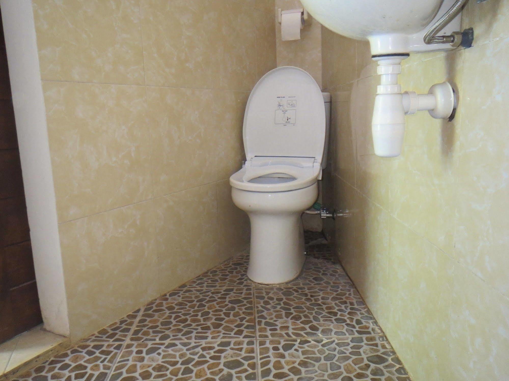 Amed Sari Beach Guesthouse Exterior foto