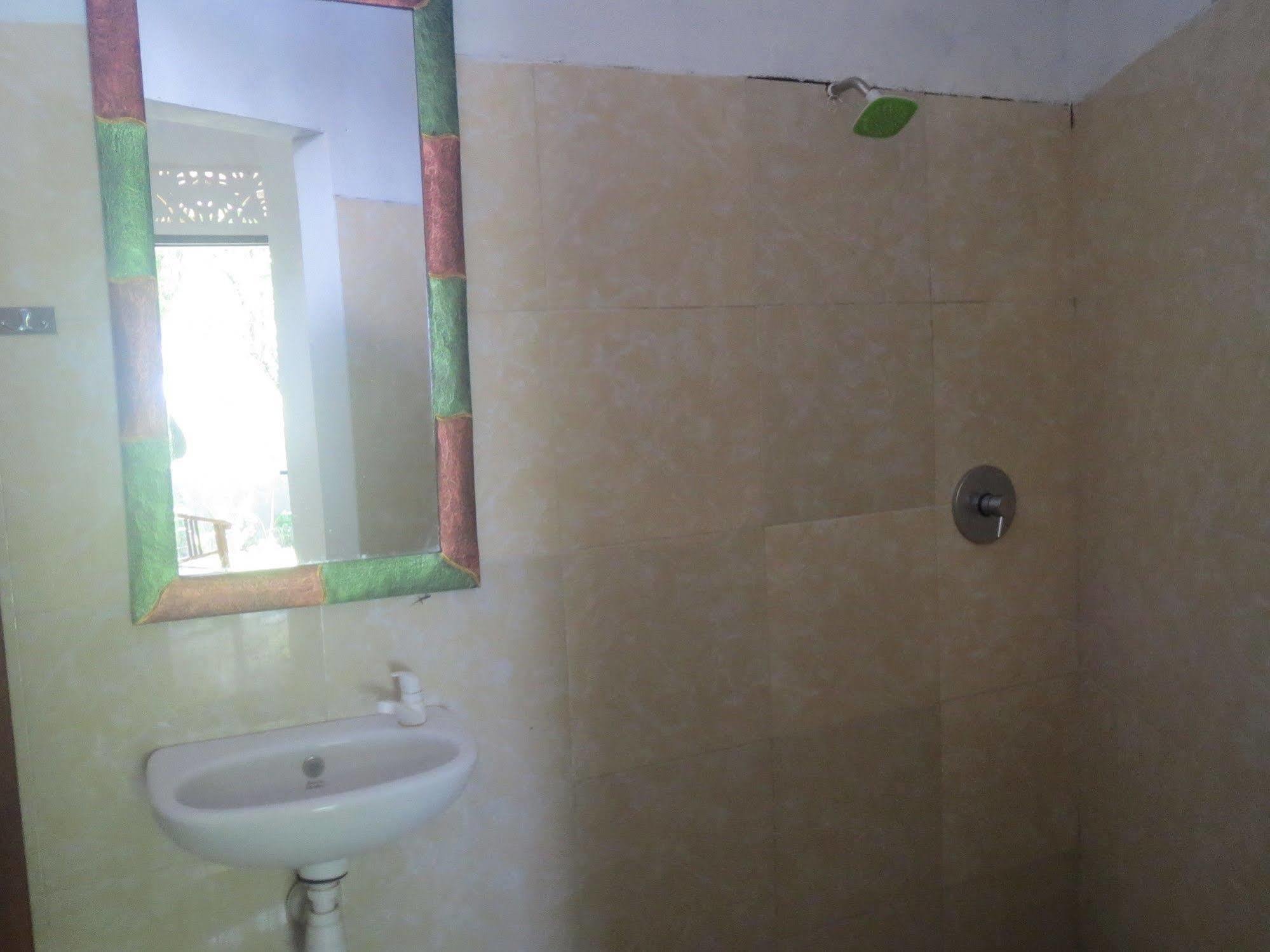 Amed Sari Beach Guesthouse Exterior foto