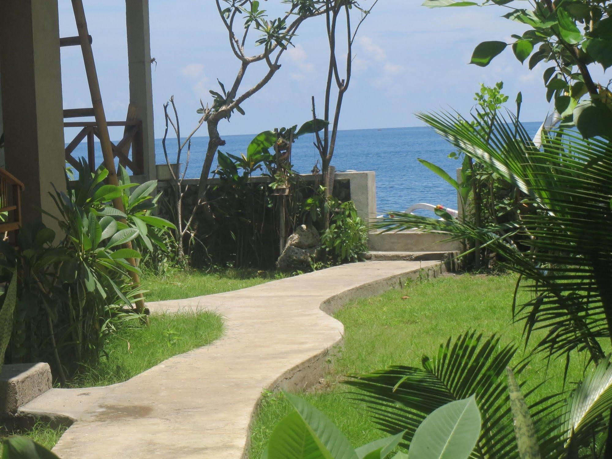 Amed Sari Beach Guesthouse Exterior foto